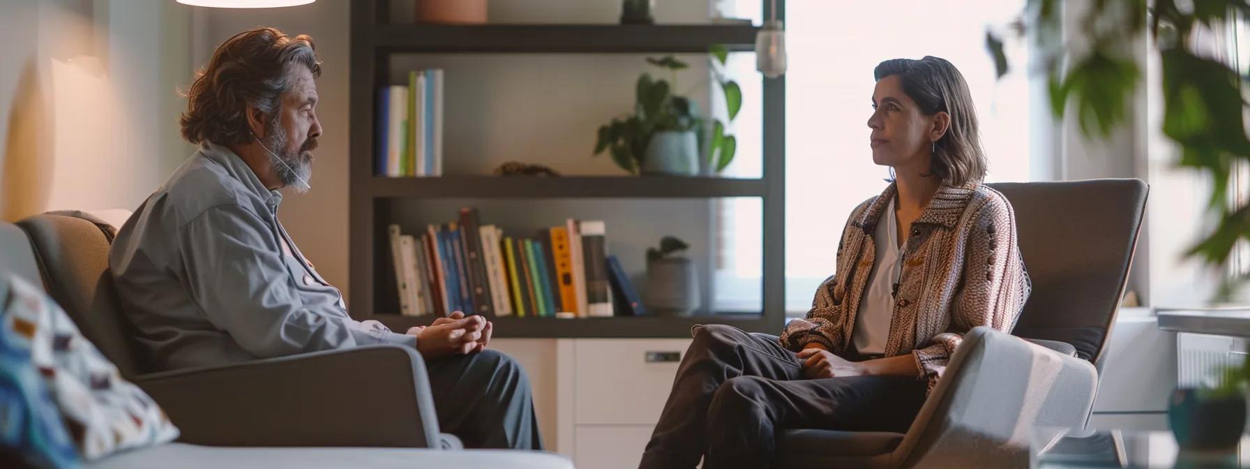 a focused therapist is seated in a modern, softly-lit office, attentively guiding a client through an engaging session of eye movement desensitization and reprocessing therapy, with visual aids and a calming atmosphere enhancing the therapeutic environment.